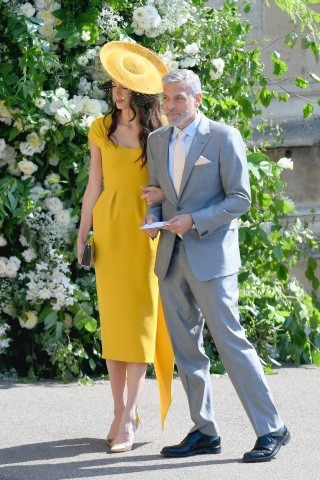 Farbliches Kontrastprogramm zu den Beckhams: Schauspieler George Clooney und seine Frau, die Menschenrechtsanwältin Amal.