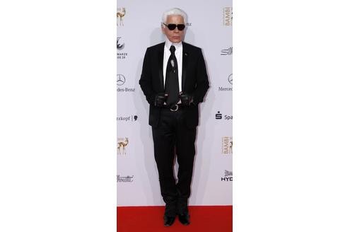 ...Designer Karl Lagerfeld,...