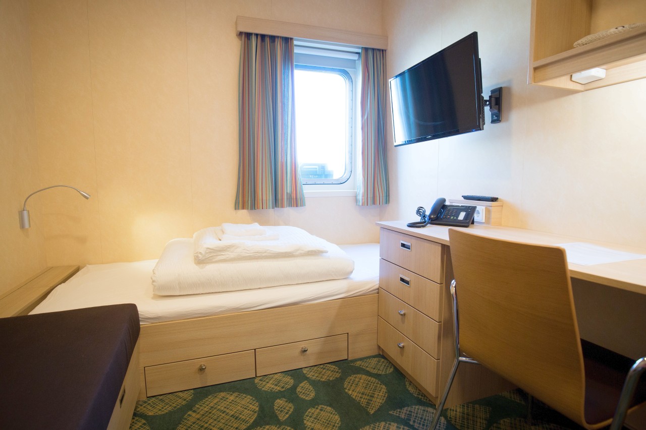 Die rund elf Quadratmeter großen Hotelzimmer sind funktional eingerichtet.