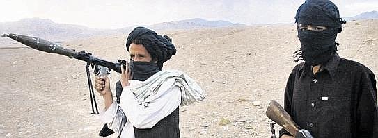 Fighters with Afghanistan_apos;s Taliban militia--543x199.jpg