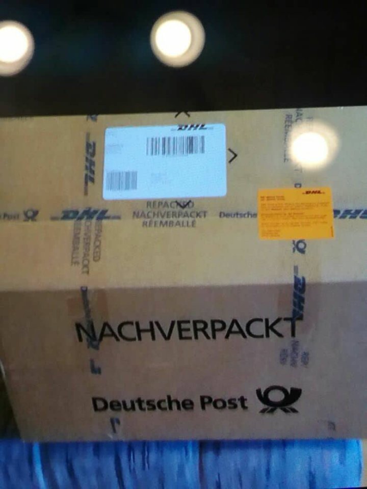Paket-DHL-Post-Nachverpackt-Umgepackt.jpg