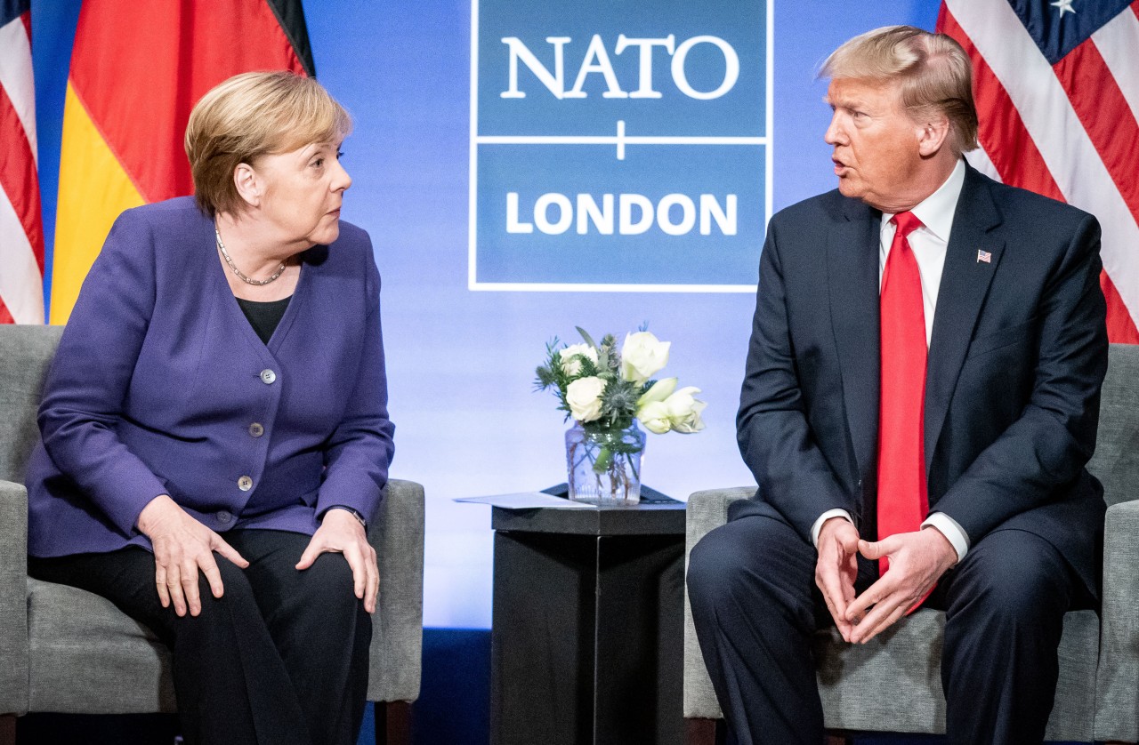 Donald Trump und Angela Merkel bei einem NATO-Treffen.
