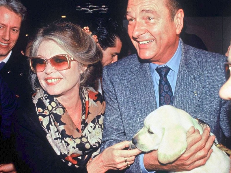 Brigitte Bardot mit Jacques Chirac - damals französischer Präsident - im Jahre 1990.