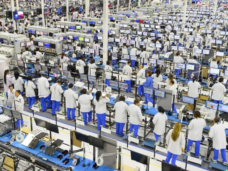 Heute ist das Handy ein Massenprodukt. Das Foto zeigt Fabrikarbeiter von Motorola in Fort Worth, Texas.