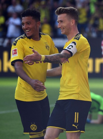 Jadon Sancho (l.) und Marco Reus sind Schlüsselspieler bei Borussia Dortmund.
