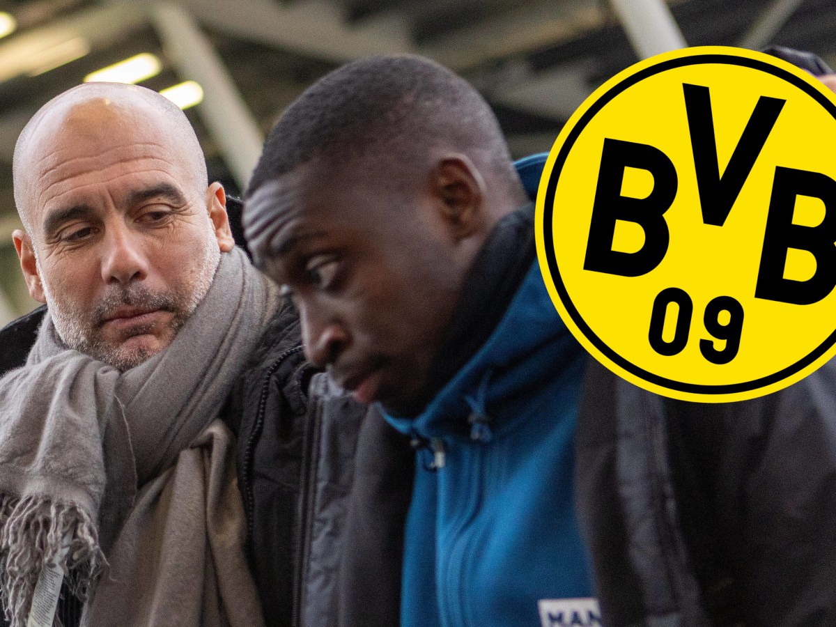 Pep Guardiola umarmt Carlos Borges.