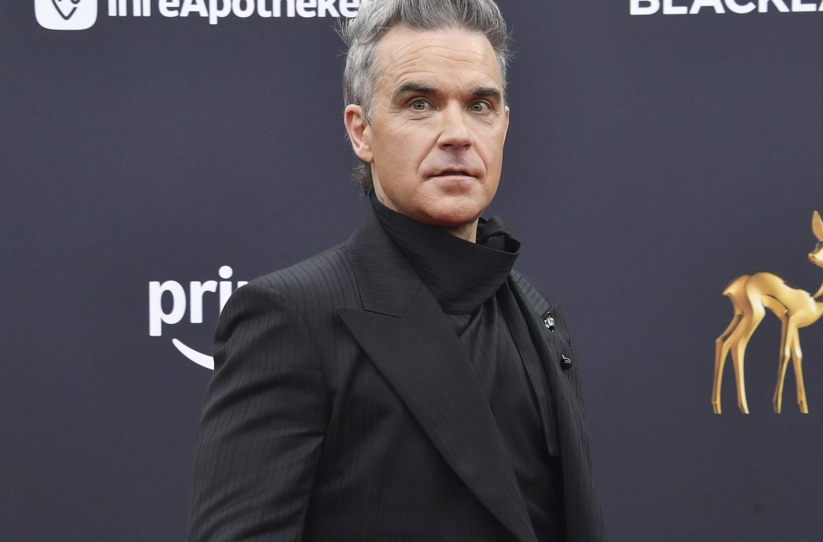 Robbie Williams ; Queen Elizabeth II.